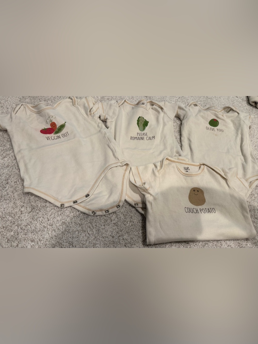 Organic Cream Baby Bodysuits 4 pack.